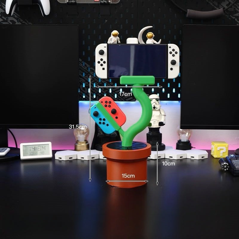 Cannibal flower game console stand holding Nintendo Switch with game card slots and USB base