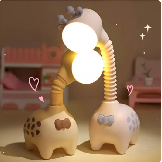 Giraffe-shaped rechargeable LED night light in pink, green, and beige with telescopic neck design