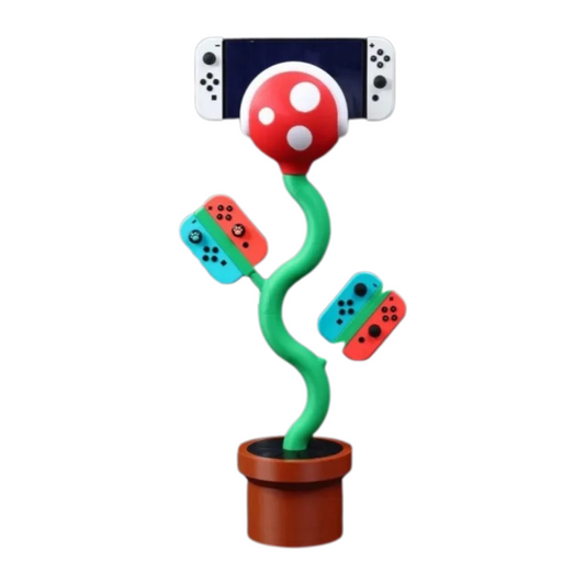 cannibal flower game console stand holding Nintendo Switch with game card slots and USB base